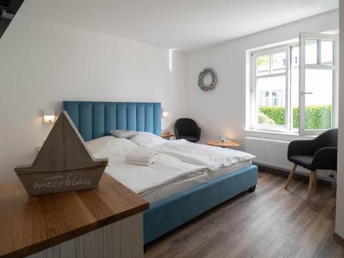 Postel nebo postele na pokoji v ubytování Hotel meerblau