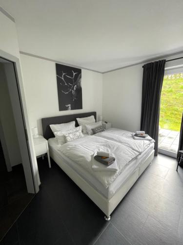 Ένα ή περισσότερα κρεβάτια σε δωμάτιο στο Appartement Max