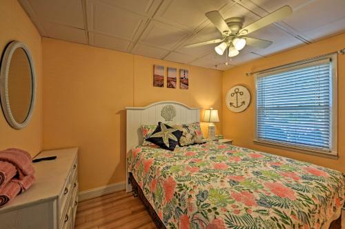 a bedroom with a bed and a ceiling fan at Direct Beach Access Ocean City Getaway in Ocean City