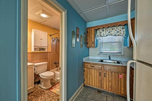 a small bathroom with a sink and a toilet at Direct Beach Access Ocean City Getaway in Ocean City