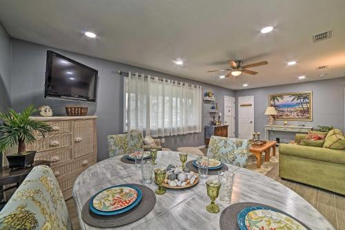 a living room with a table and chairs and a television at Less Than 3 Mi to South Padre Beach Port Isabel Home in Port Isabel