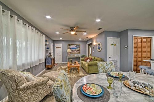 a living room with a couch and a table at Less Than 3 Mi to South Padre Beach Port Isabel Home in Port Isabel