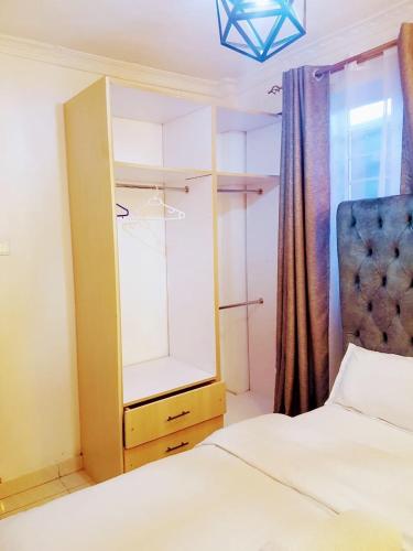 Letto o letti in una camera di Executive Two & Three Bedroom Suites