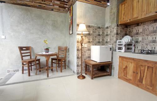 Kuchyň nebo kuchyňský kout v ubytování Sari House Ubud - Balinese Style Homestay
