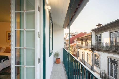 a view from the balcony of a building at Covelo - The Original Rooms and Suites in Amarante