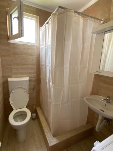 Ένα μπάνιο στο Apartmani Zecevic