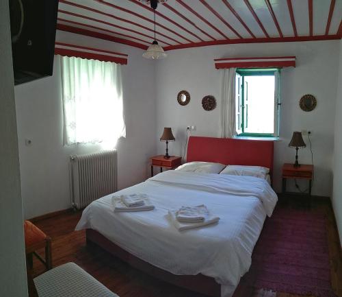 Guesthouse Iroにあるベッド