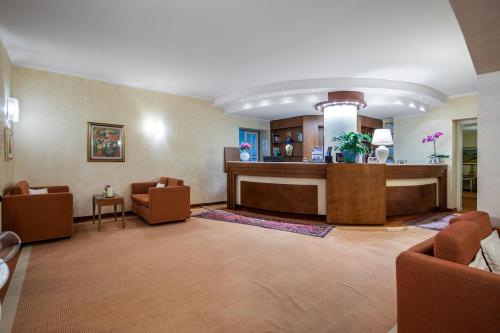 Park Hotel Olimpiaにあるシーティングエリア