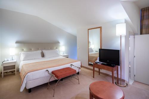 Katil atau katil-katil dalam bilik di Park Hotel Olimpia