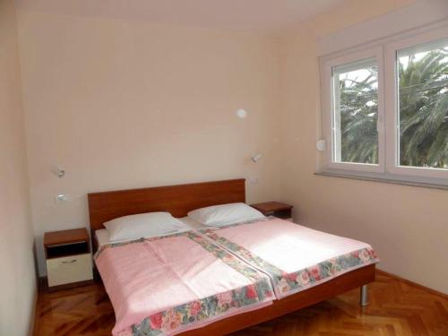 Posteľ alebo postele v izbe v ubytovaní Apartment in Duce with sea view, balcony, air conditioning, Wi-Fi (4166-3)