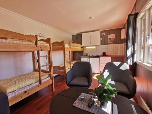 Säng eller sängar i ett rum på Reipå Camping