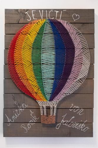 a picture of a colorful hot air balloon at Žabinec - penzion, vinotéka in Kurdějov