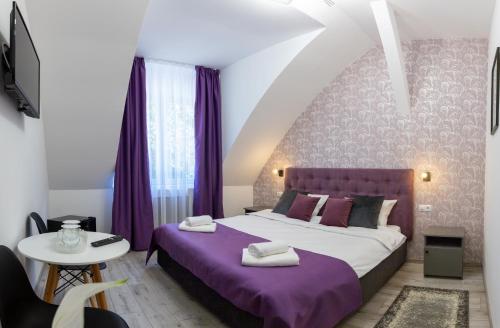 Postel nebo postele na pokoji v ubytování Hotel Amel Rooms