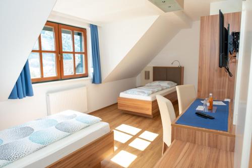 Voodi või voodid majutusasutuse Gästehaus Schütz toas