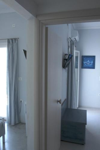 Μια τηλεόραση ή/και κέντρο ψυχαγωγίας στο Passos Rooms