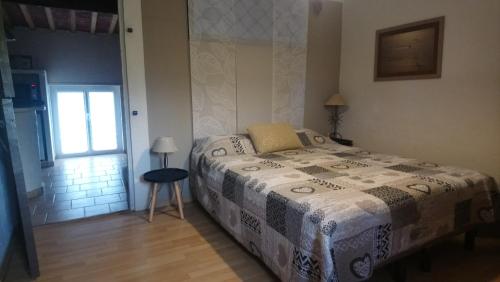 Postel nebo postele na pokoji v ubytování Gîte Mas de la Restanque