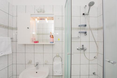 Koupelna v ubytování Dalma Residence apartman Lavandella