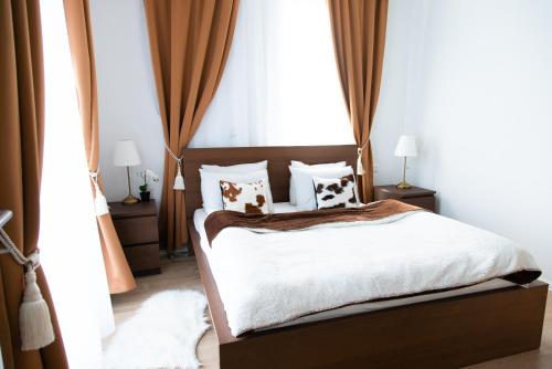 Кровать или кровати в номере Apartmán Vila Zuberec