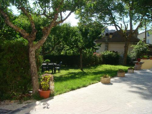Giardino di Residence Villa Valsi