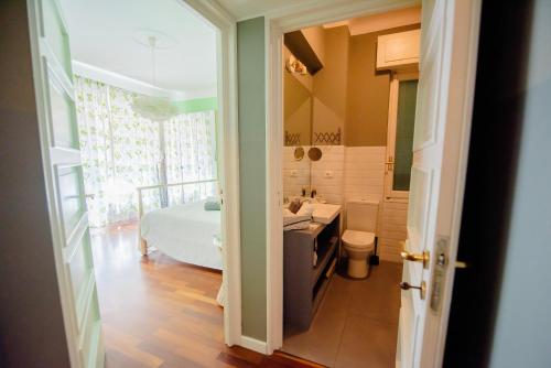 Kylpyhuone majoituspaikassa Apartment Via Alessandro Volta