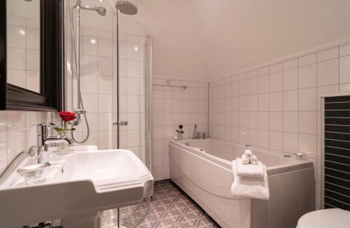 Kúpeľňa v ubytovaní Grand Hotel Flekkefjord
