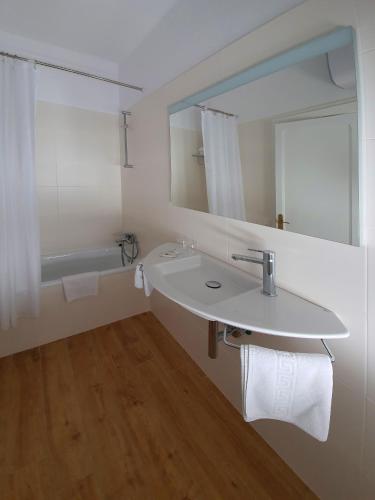 Koupelna v ubytování Hostal Canigó