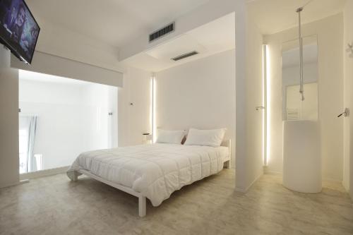 Кровать или кровати в номере Luxury House Lecce -Le mie 3 Suites-