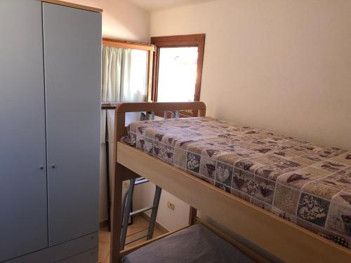 Postel nebo postele na pokoji v ubytování Le case di Bea