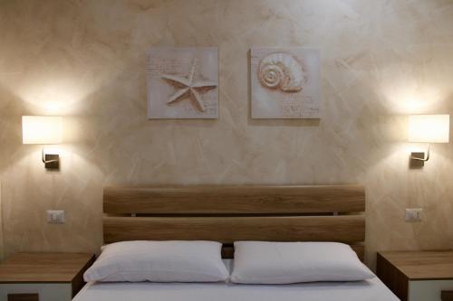 Katil atau katil-katil dalam bilik di MEDUSA Residence B&B