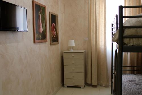 Televisyen dan/atau pusat hiburan di MEDUSA Residence B&B
