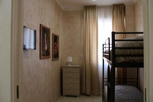 Katil atau katil-katil dalam bilik di MEDUSA Residence B&B