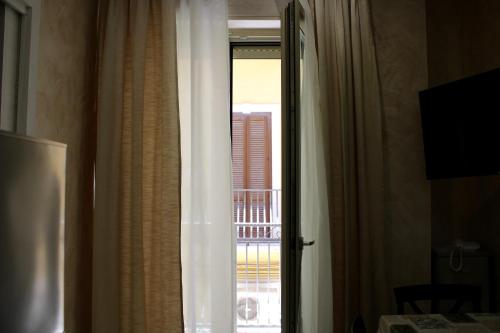 Televisyen dan/atau pusat hiburan di MEDUSA Residence B&B
