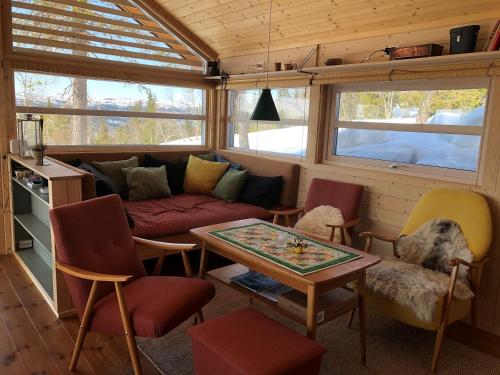 Imagem da galeria de Skarehaug - koselig hytte med 3 soverom em Skadeland