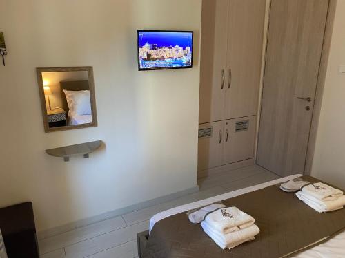 Postel nebo postele na pokoji v ubytování Helena's apartment