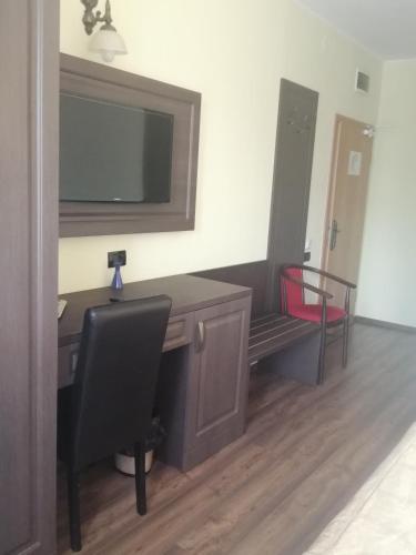 TV a/nebo společenská místnost v ubytování Hotel Piemonte