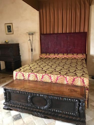 Postel nebo postele na pokoji v ubytování Chateau Manoir de Chandoiseau