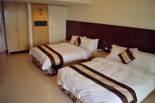 Cama o camas de una habitación en Yake Homestay