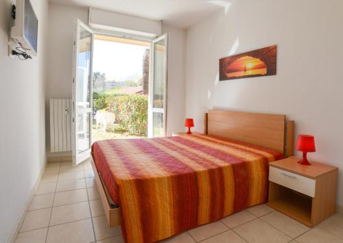 Katil atau katil-katil dalam bilik di Residence Laura