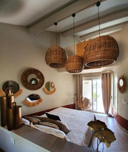 Postel nebo postele na pokoji v ubytování Hôtel L' Estelle en Camargue