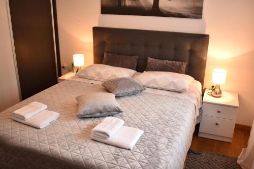 Postel nebo postele na pokoji v ubytování Apartment Tasha's Home