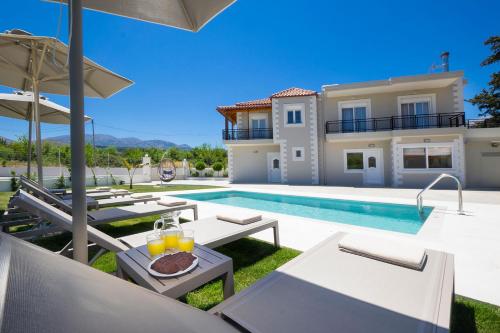 obraz willi z basenem w obiekcie MM Villa w Chanii