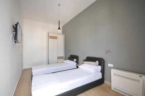 Ein Bett oder Betten in einem Zimmer der Unterkunft Orange Lux Apartments