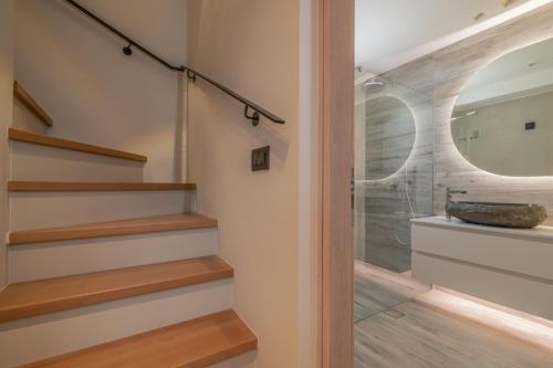 a bathroom with stairs and a glass shower at Villa Verde - Heated Pool with Stunning Views, by ZanteWize in Kallithea