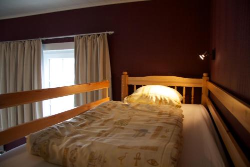 Una cama o camas en una habitación de Breeden Steeger Hoeve