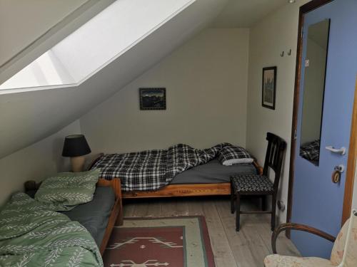 Postel nebo postele na pokoji v ubytování vieux colombier