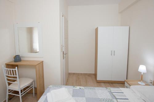 Postel nebo postele na pokoji v ubytování (Apt.1) Lofos Apartments in Vergia Halkidiki