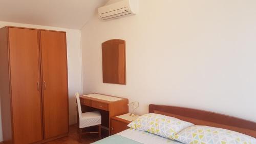 Postel nebo postele na pokoji v ubytování Apartment A&M