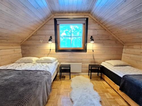 Cama o camas de una habitación en Hiekkatupa