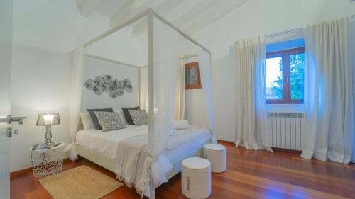 Posteľ alebo postele v izbe v ubytovaní Villa Canacati