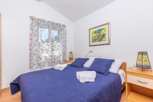 Ένα ή περισσότερα κρεβάτια σε δωμάτιο στο Janus apartments